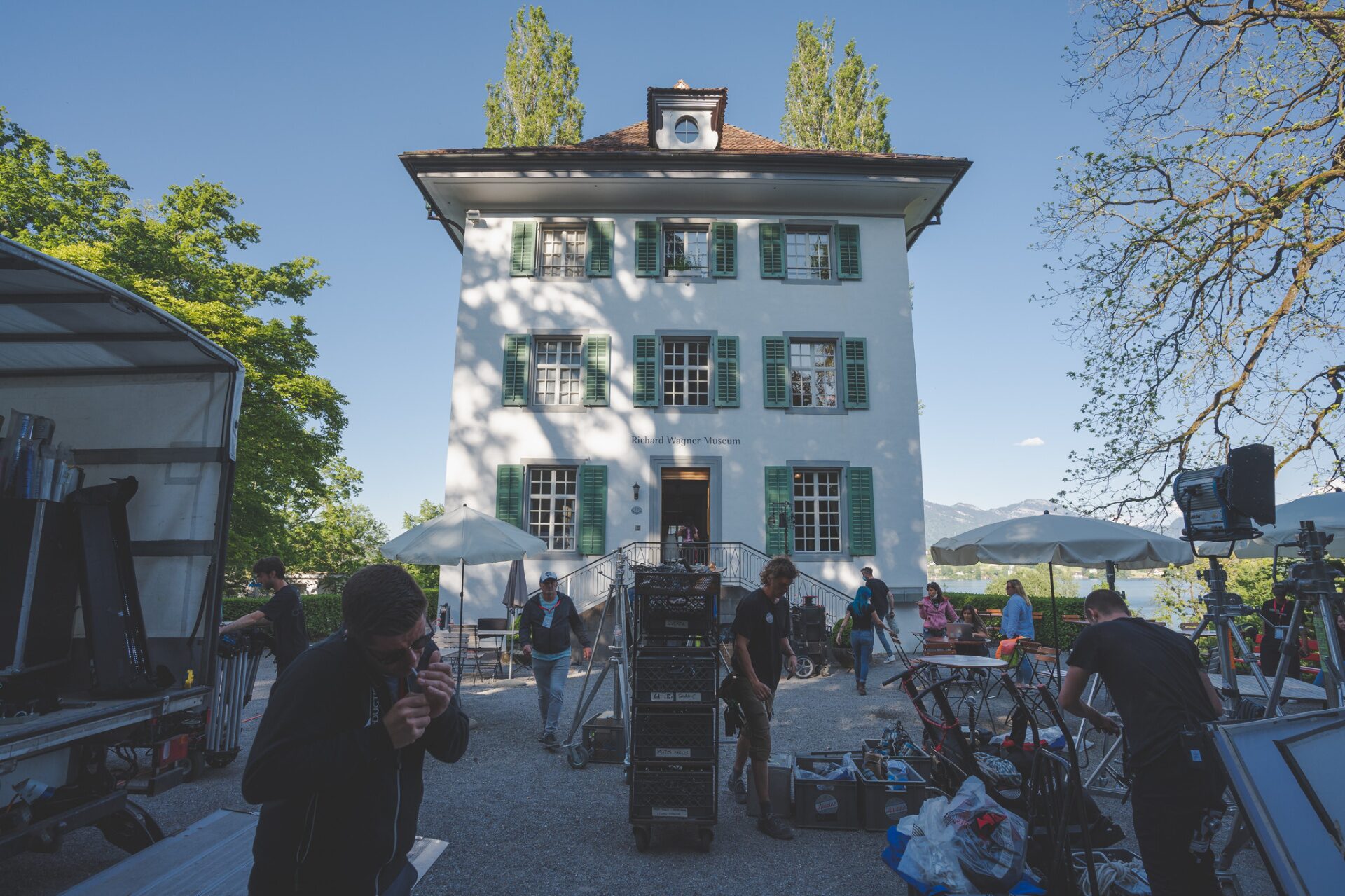 Production setup with grip carts and lighting in front of the Richard Wagner Museum in Lucerne