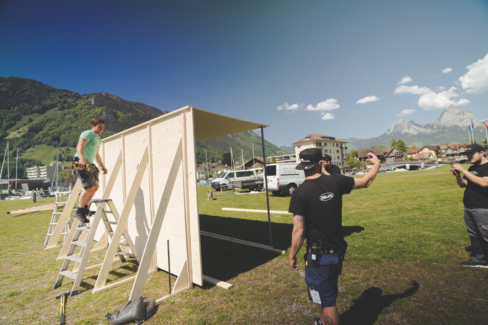 Set construction of a wooden hut by Lake Lucerne with the Mythen peaks in the background